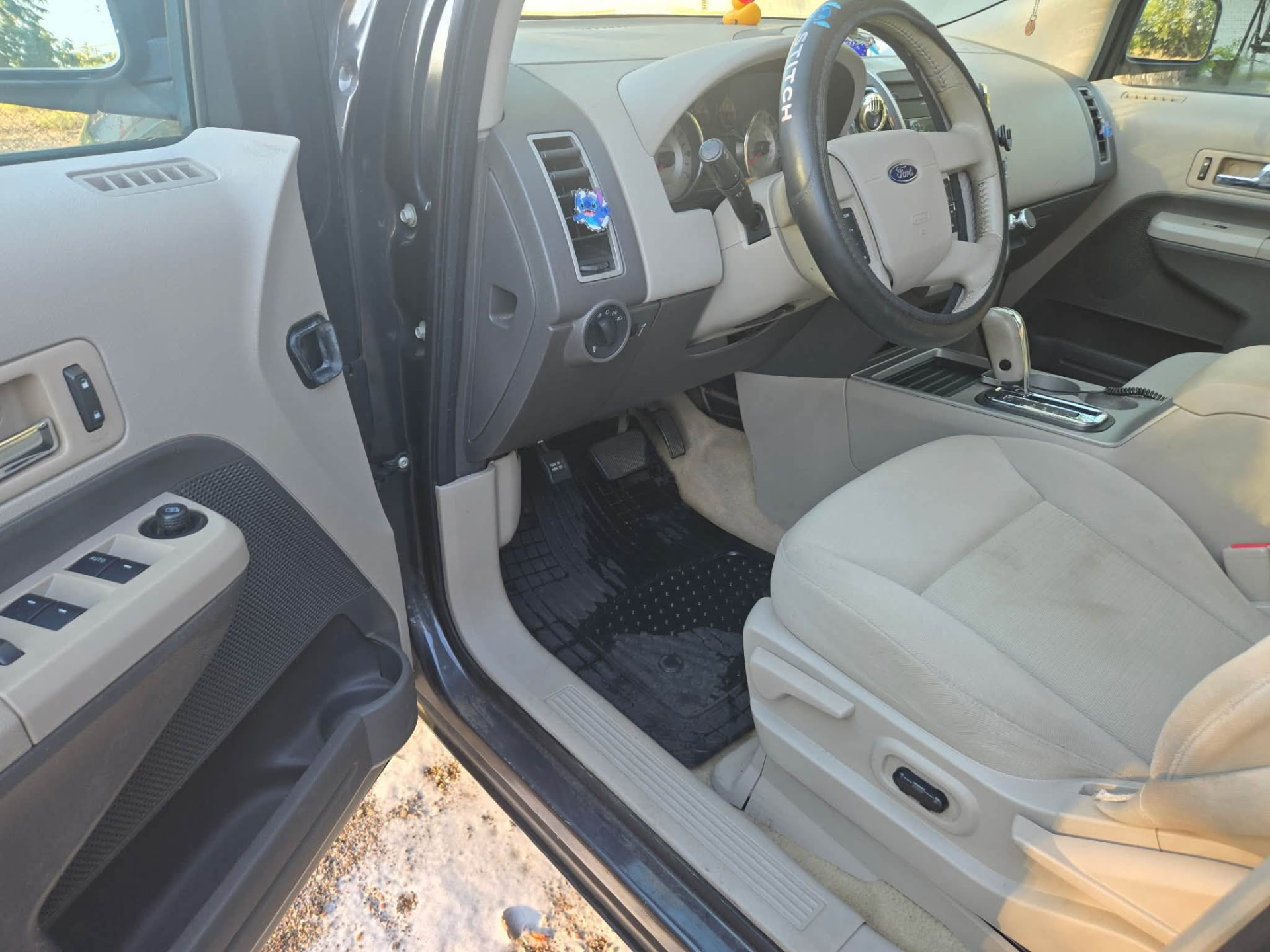 SUV interior after a detail, dash and front seats
